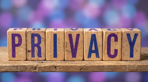 Illustration of wooden blocks spelling PRIVACY for Andrew Hillman's privacy page
